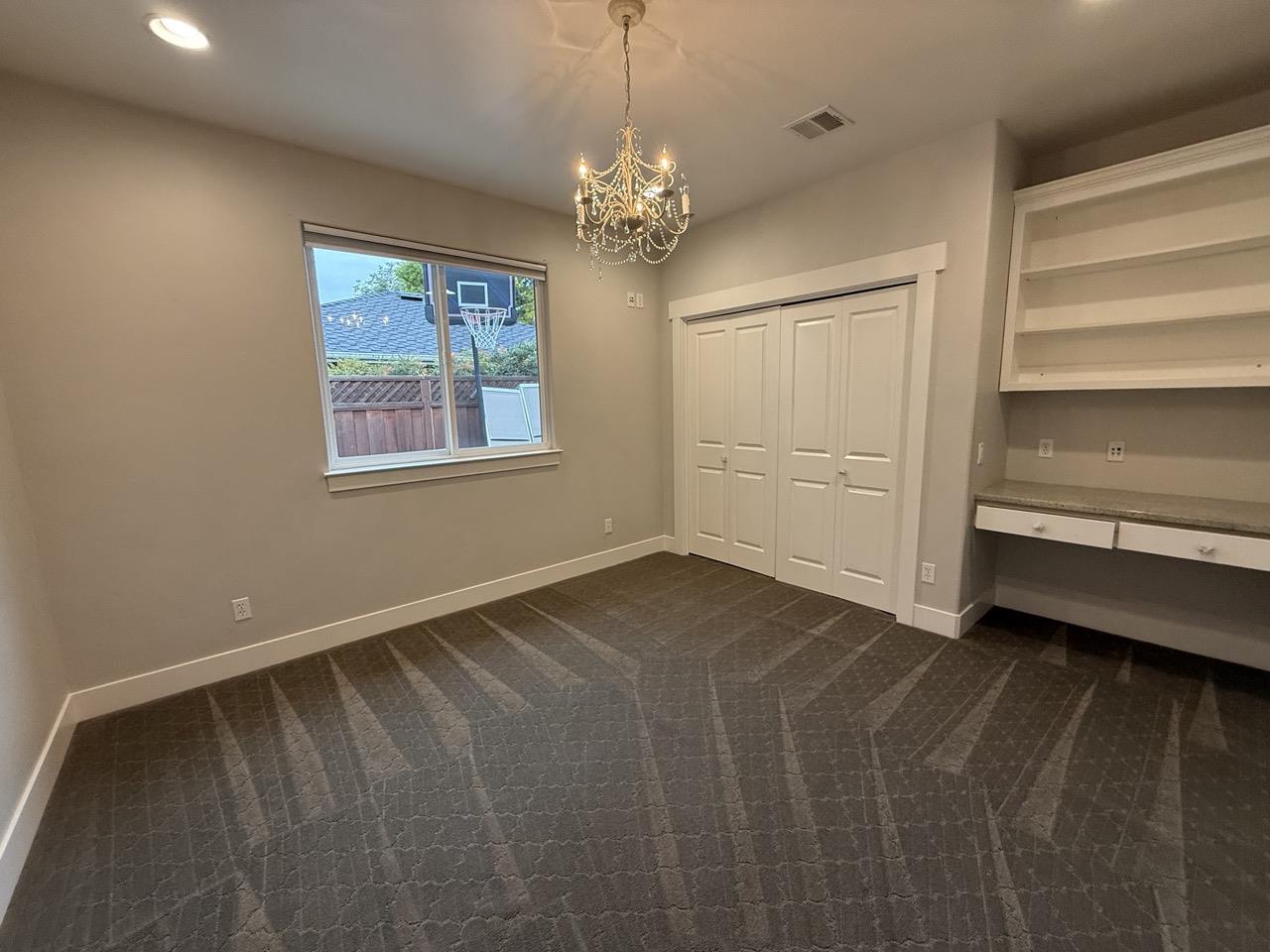 94 Harold Avenue Santa Clara, CA 95050 - Photo 26 of 34 a view of an empty room with a window