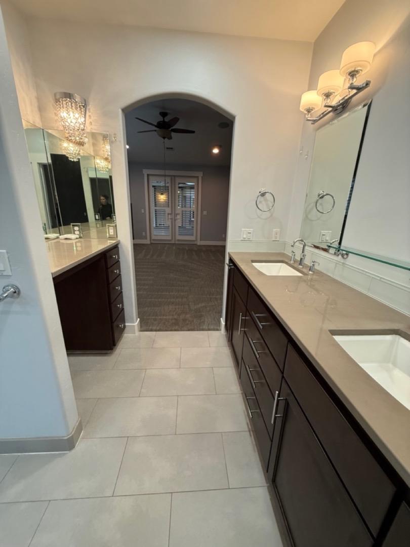 94 Harold Avenue Santa Clara, CA 95050 - Photo 30 of 34 a bathroom with a sink a double vanity and a mirror