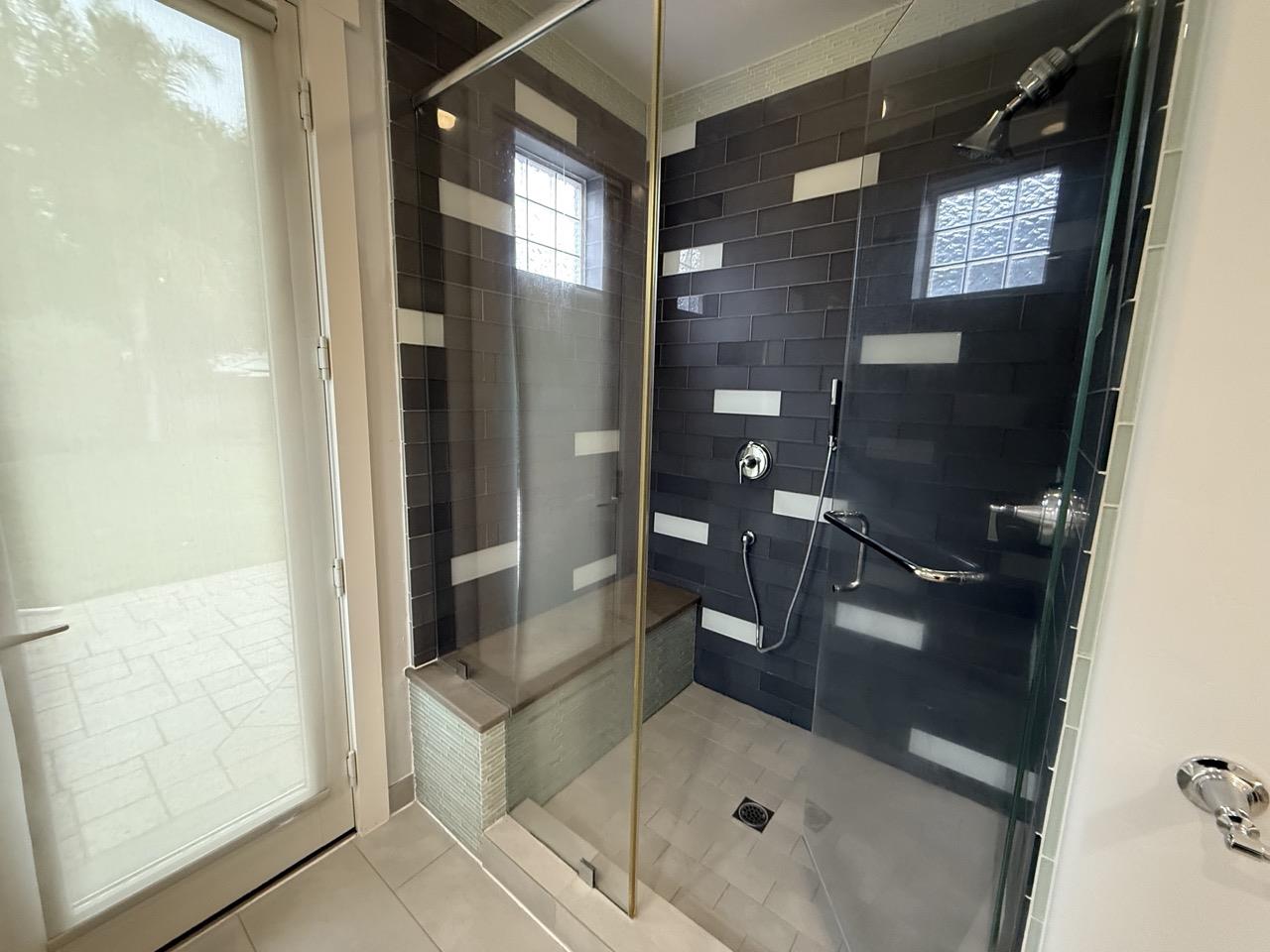 94 Harold Avenue Santa Clara, CA 95050 - Photo 32 of 34 a bathroom with a glass shower door