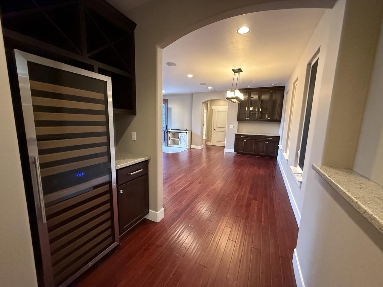 94 Harold Avenue Santa Clara, CA 95050 - Photo 7 of 34 a view of a hallway view with wooden floor and staircase
