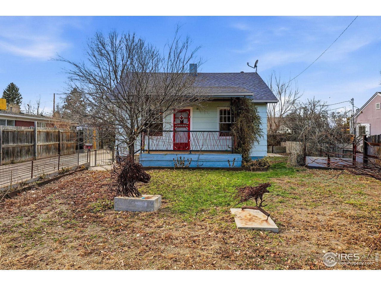 4635 Teller Street Wheat Ridge, CO 80033 - Photo 2 of 36 a house view with a backyard space