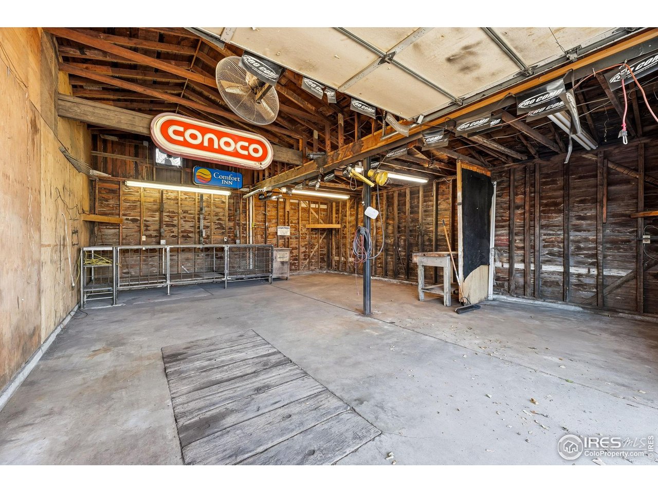 4635 Teller Street Wheat Ridge, CO 80033 - Photo 6 of 36 a view of a room with wooden walls