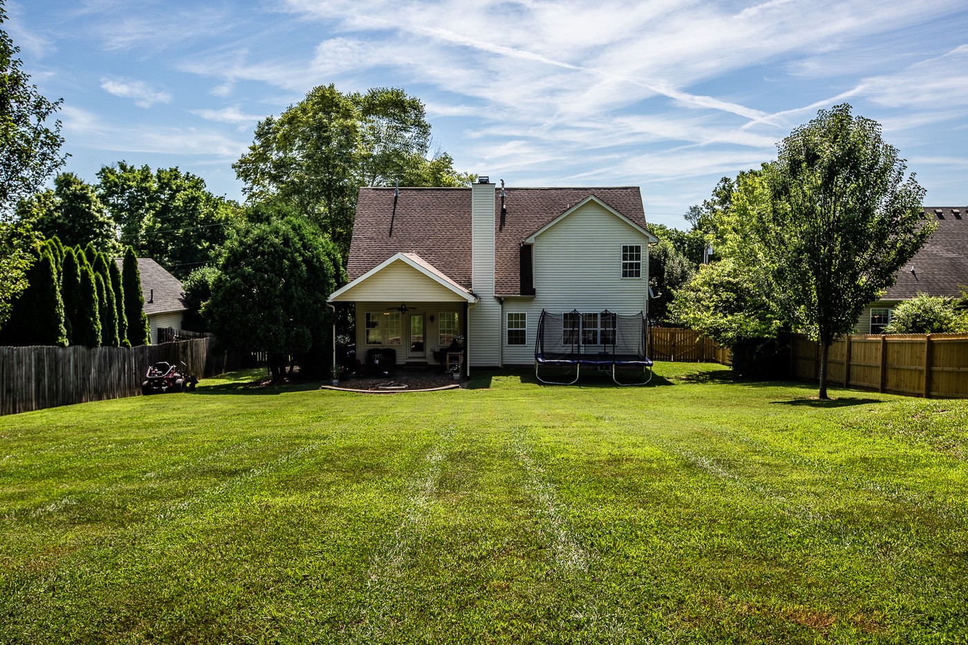 1838 O'Reilly Circle Spring Hill, TN 37174 - Photo 3 of 36 a front view of a house with a yard and trees
