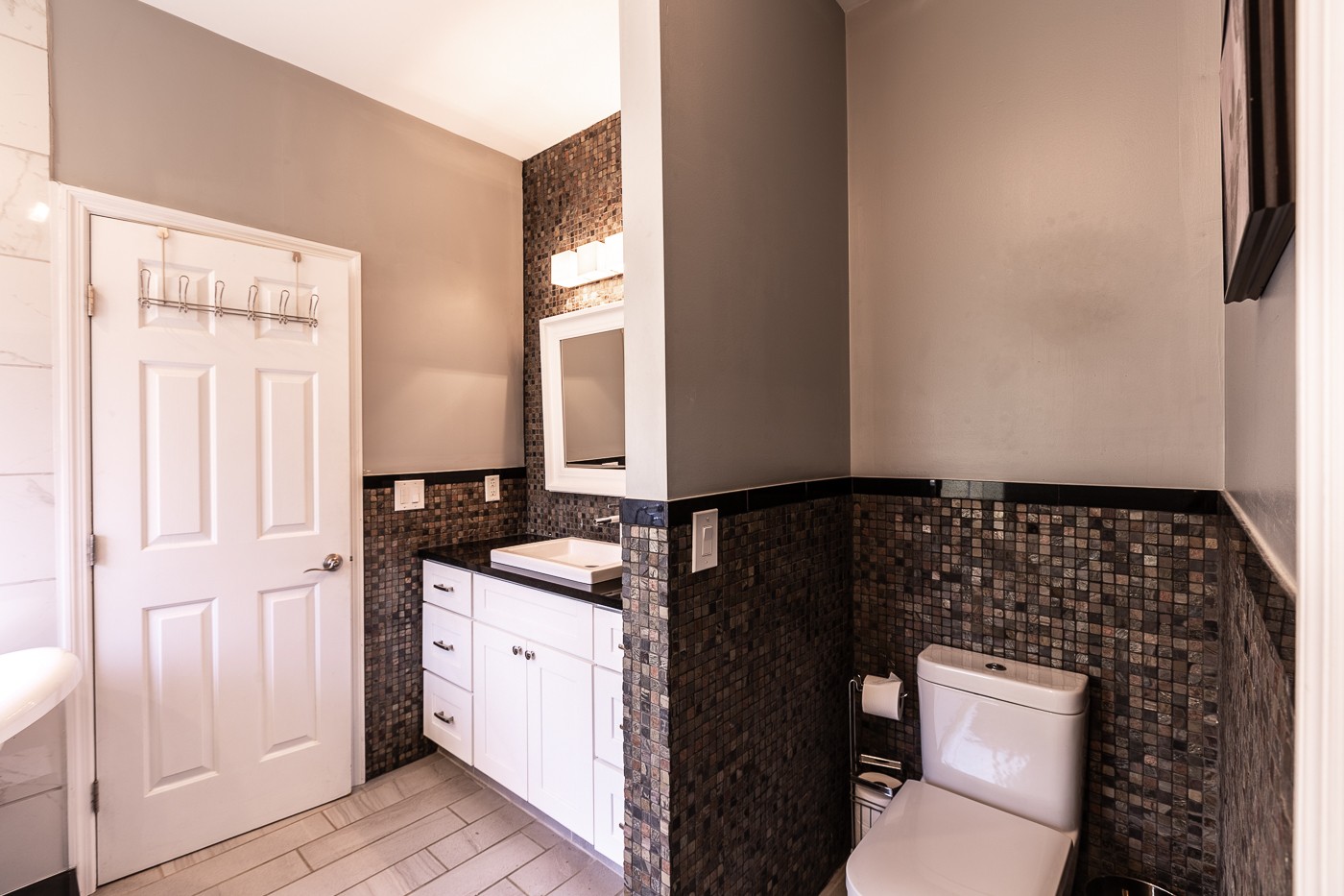 1838 O'Reilly Circle Spring Hill, TN 37174 - Photo 22 of 36 a bathroom with a sink a toilet and a mirror