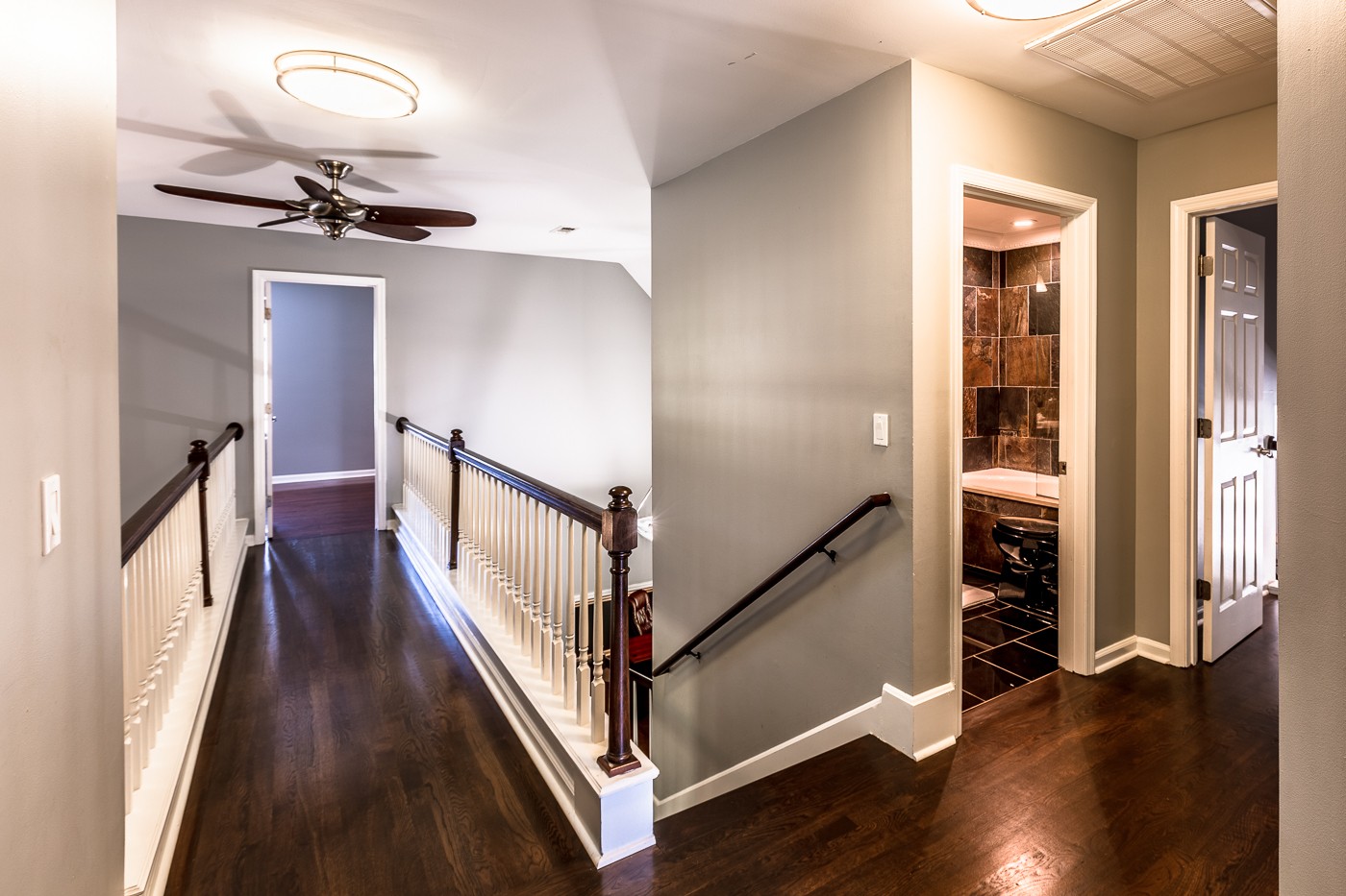 1838 O'Reilly Circle Spring Hill, TN 37174 - Photo 24 of 36 a view of a hallway with wooden floor and staircase
