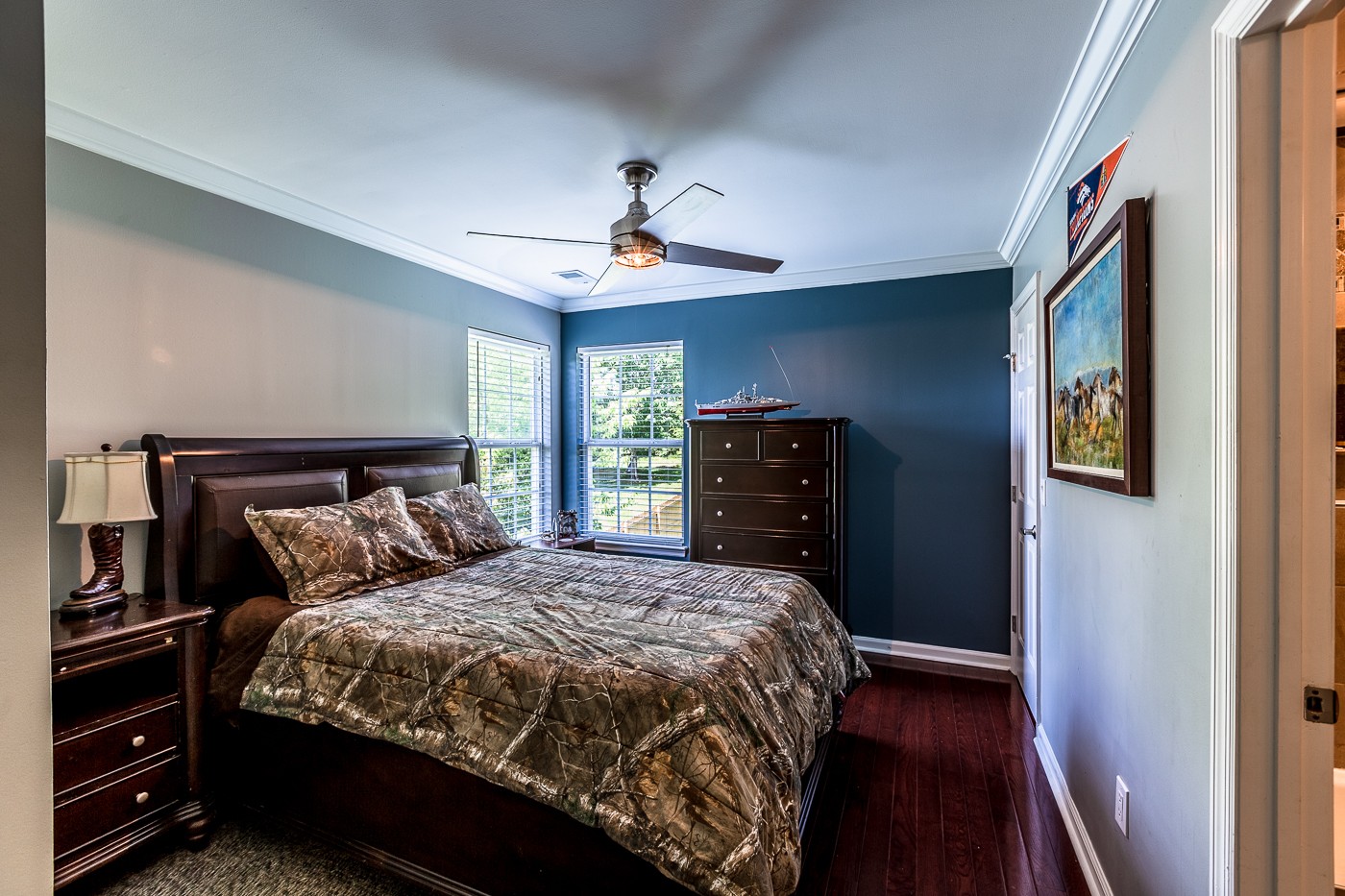 1838 O'Reilly Circle Spring Hill, TN 37174 - Photo 25 of 36 a bedroom with a bed and a chandelier