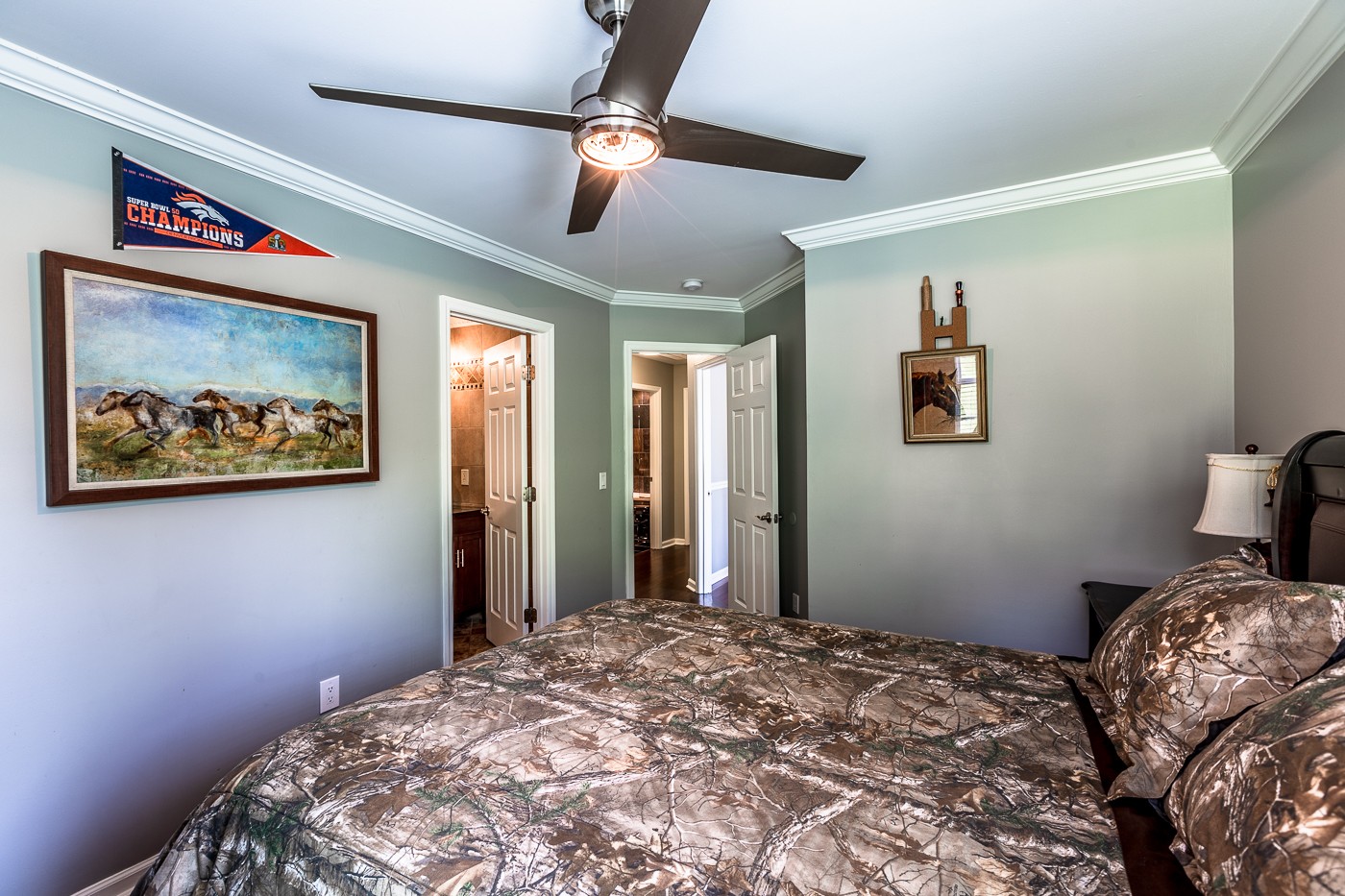 1838 O'Reilly Circle Spring Hill, TN 37174 - Photo 26 of 36 a bedroom with bed and a chandelier