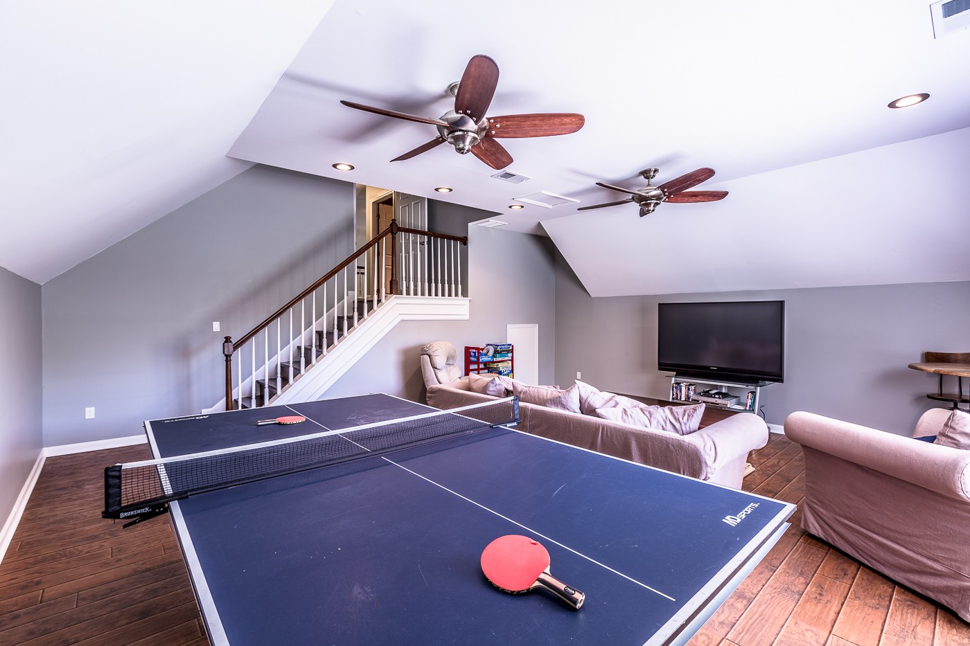 1838 O'Reilly Circle Spring Hill, TN 37174 - Photo 33 of 36 a living room with furniture pool table and a ceiling fan