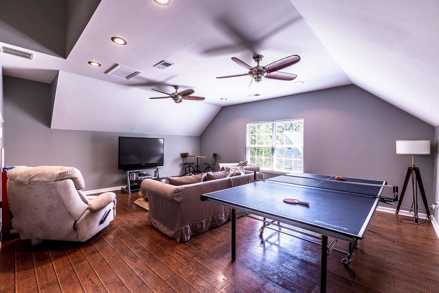 1838 O'Reilly Circle Spring Hill, TN 37174 - Photo 34 of 36 a living room with furniture a flat screen tv and wooden floor