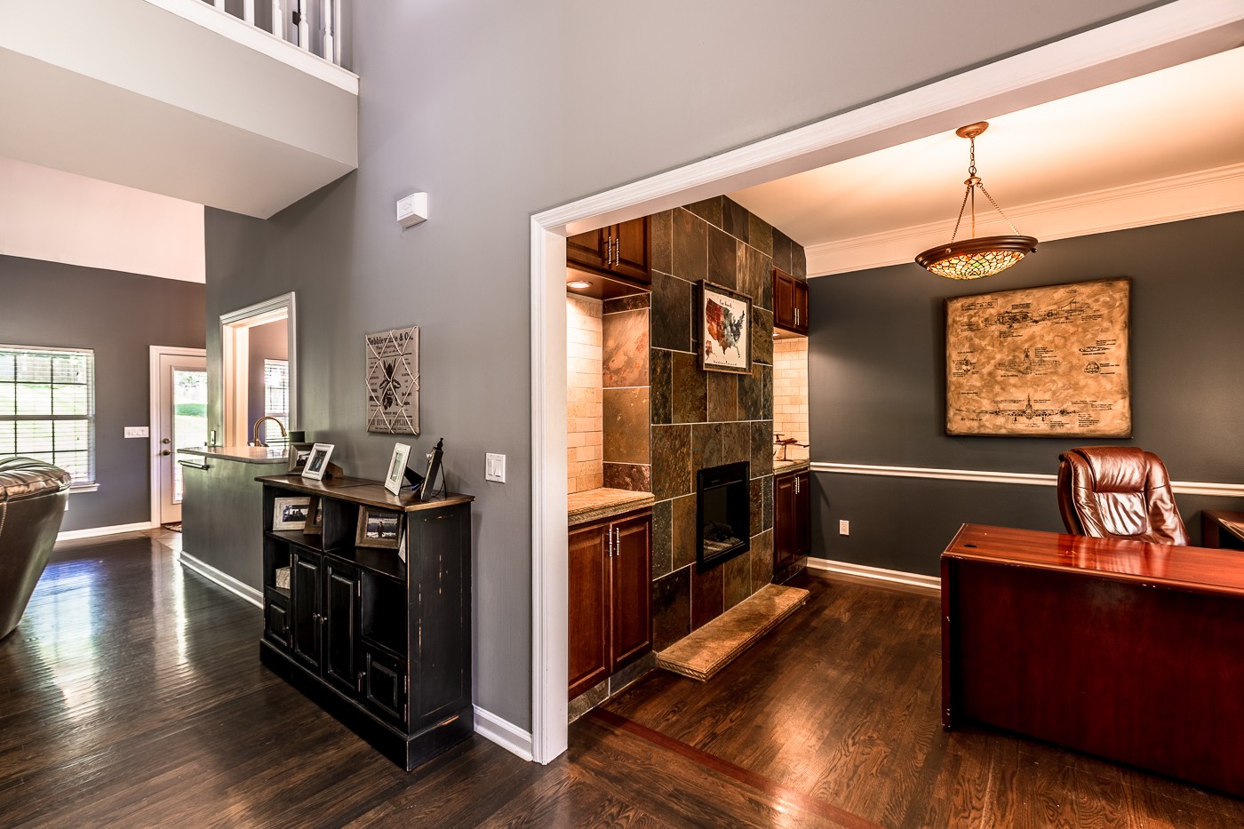 1838 O'Reilly Circle Spring Hill, TN 37174 - Photo 8 of 36 a kitchen with stainless steel appliances granite countertop a refrigerator a stove and a wooden floors