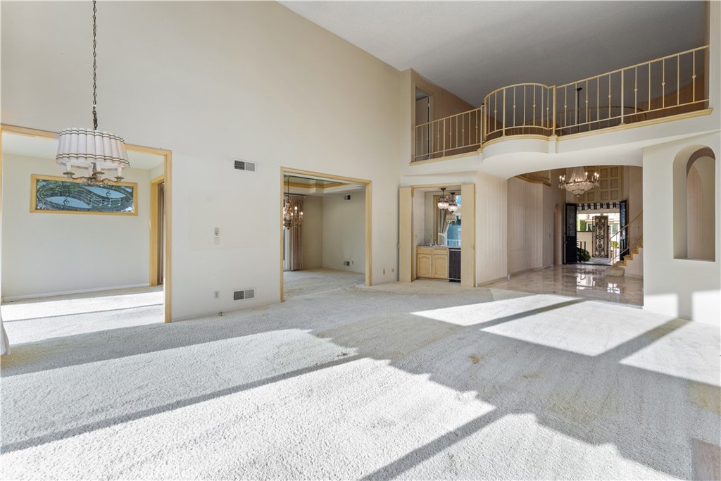 1 Rue Du Parc Newport Beach, CA 92660 - Photo 23 of 49 a spacious bathroom with a granite countertop sink a mirror and shower