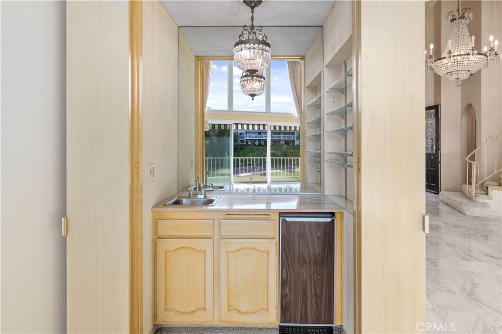 1 Rue Du Parc Newport Beach, CA 92660 - Photo 24 of 49 a dining table with a window