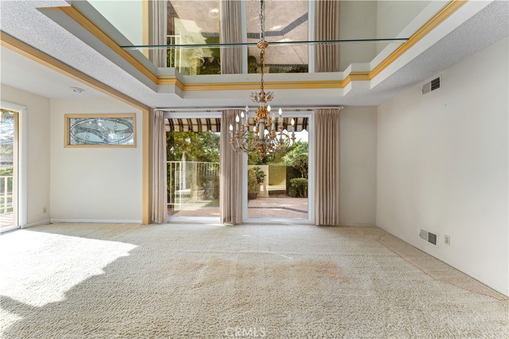 1 Rue Du Parc Newport Beach, CA 92660 - Photo 27 of 49 a view of a big room with a windows and entrance