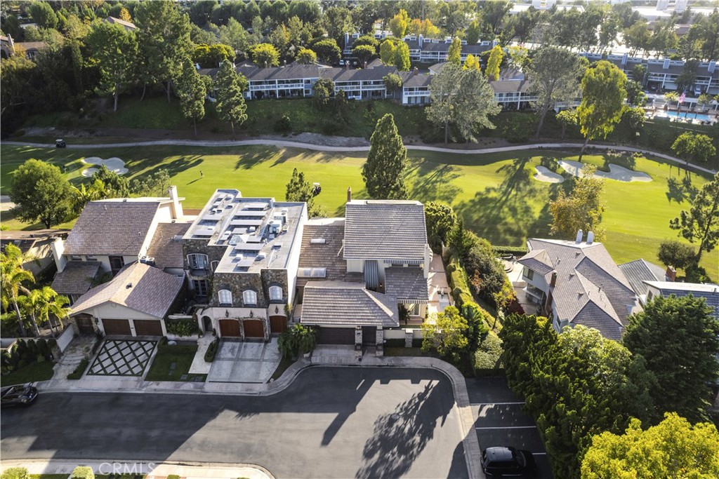 1 Rue Du Parc Newport Beach, CA 92660 - Photo 45 of 49 an aerial view of residential houses with outdoor space and swimming pool