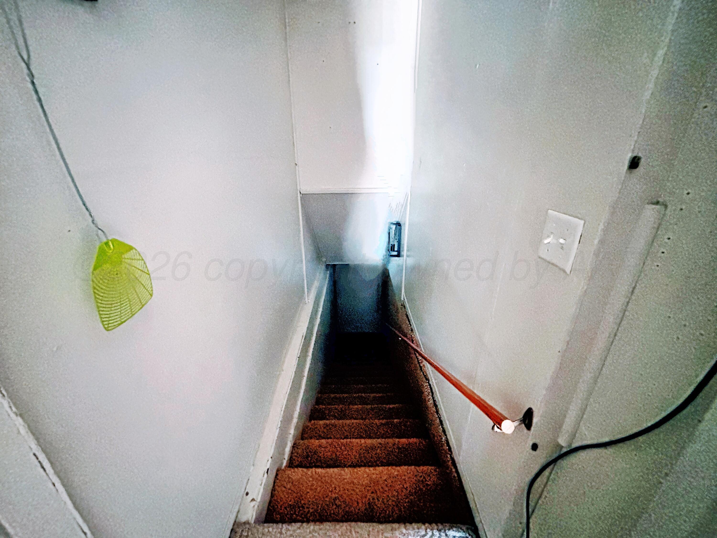 1622 South Colgate Street Perryton, TX 79070 - Photo 20 of 28 1622 S Colgate basement stairs