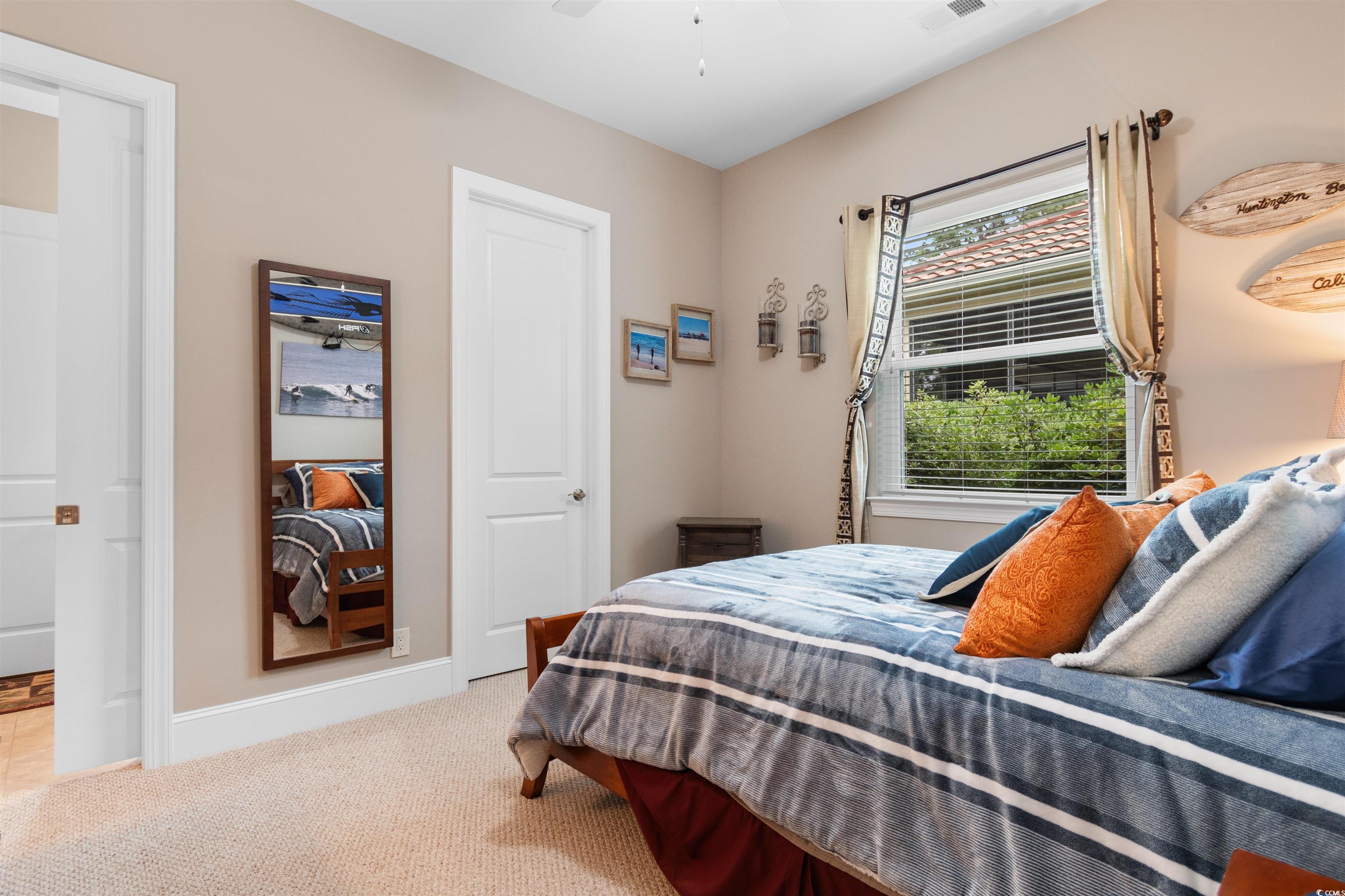 7253 Seville Drive Myrtle Beach, SC 29572 - Photo 21 of 39 Carpeted bedroom with baseboards