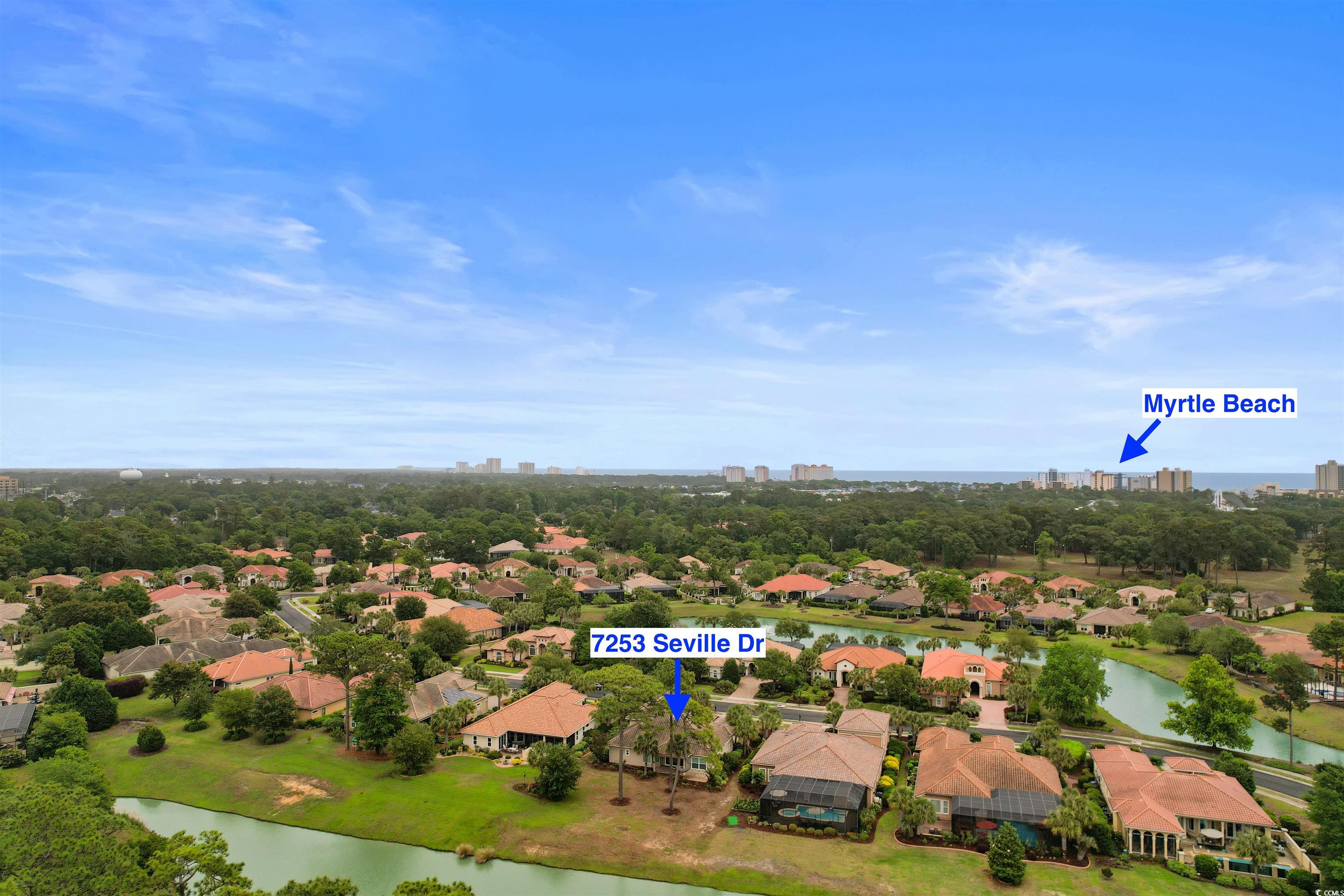 7253 Seville Drive Myrtle Beach, SC 29572 - Photo 37 of 39 Aerial view of residential area with a large body of water