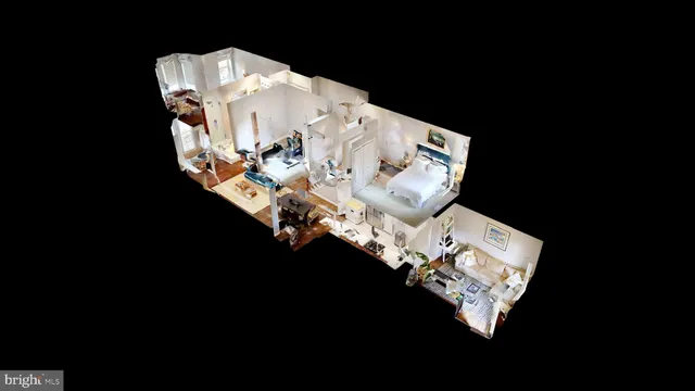 a view of table and chair in the room