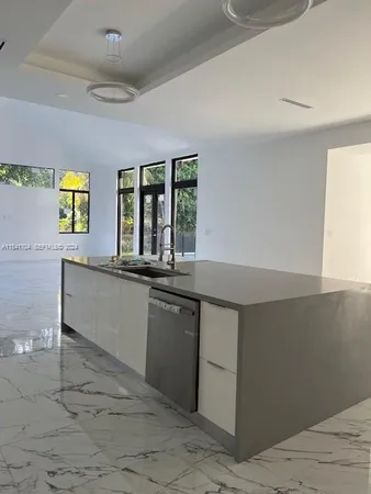 a bathroom with a toilet and sink