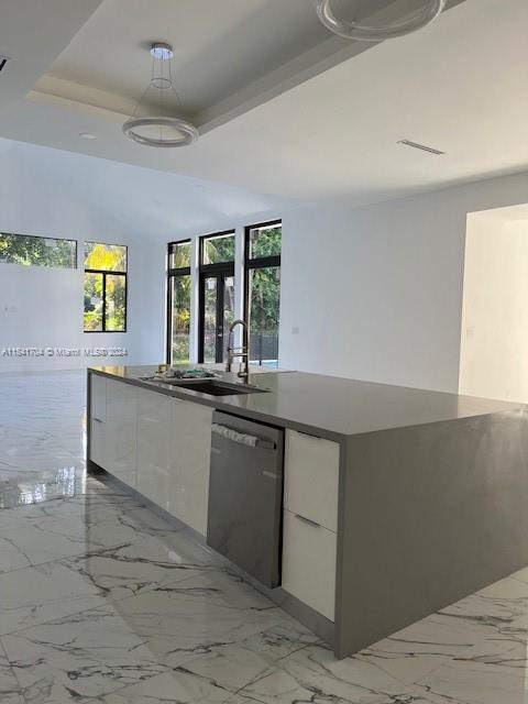 5455 Southwest 60th Court Miami, FL 33155 - Photo 15 of 68 a kitchen with granite countertop a sink and a stove