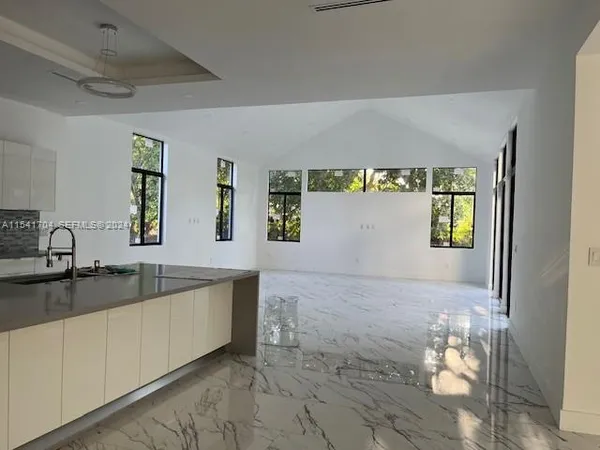 a view of an empty room and window