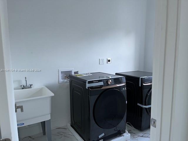 5455 Southwest 60th Court Miami, FL 33155 - Photo 19 of 68 a utility room with dryer and washer
