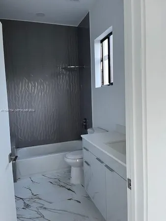 a view of a room with rack on the wall