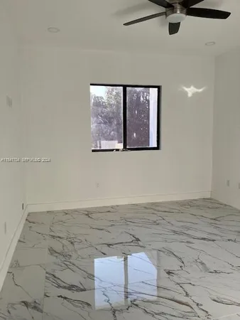 a view of a room with a window