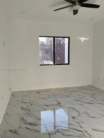 a view of a room with a window