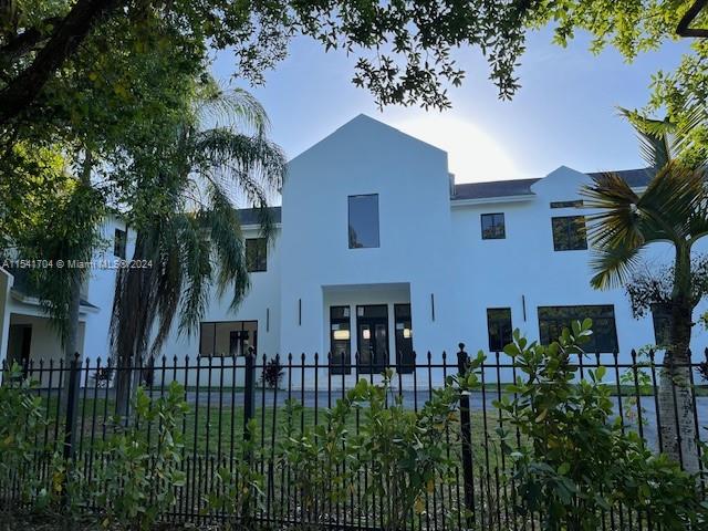 5455 Southwest 60th Court Miami, FL 33155 - Photo 4 of 68 front view of a house with a garden