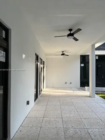 a view of a room with a bench