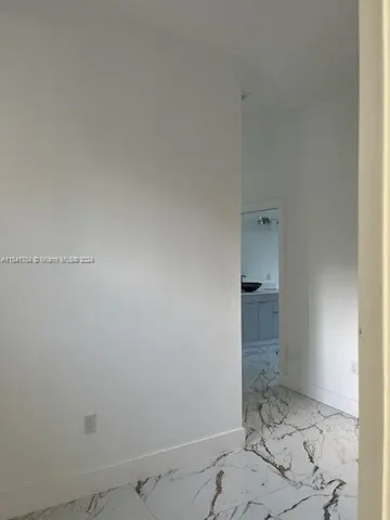 a view of a house with backyard and garden