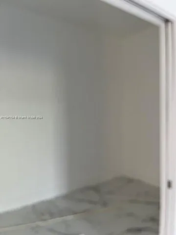 a view of backyard with green space