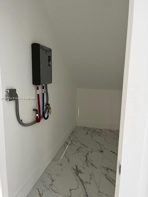 5455 Southwest 60th Court Miami, FL 33155 - Photo 55 of 68 an empty room with wooden floor and mirror