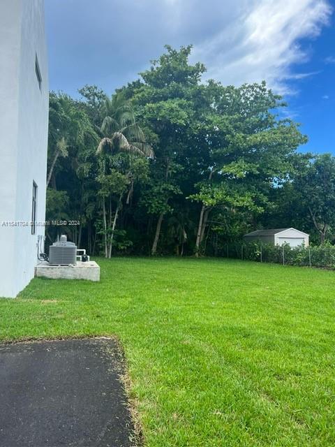 5455 Southwest 60th Court Miami, FL 33155 - Photo 59 of 68 a view of a garden with a slide