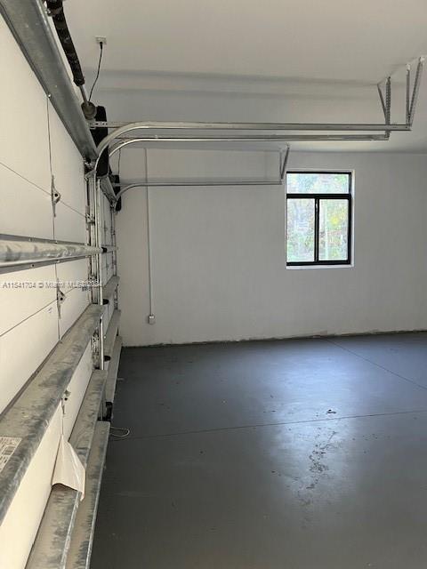 5455 Southwest 60th Court Miami, FL 33155 - Photo 67 of 68 a view of a room with rack on the wall