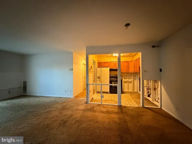 an empty room with sliding door