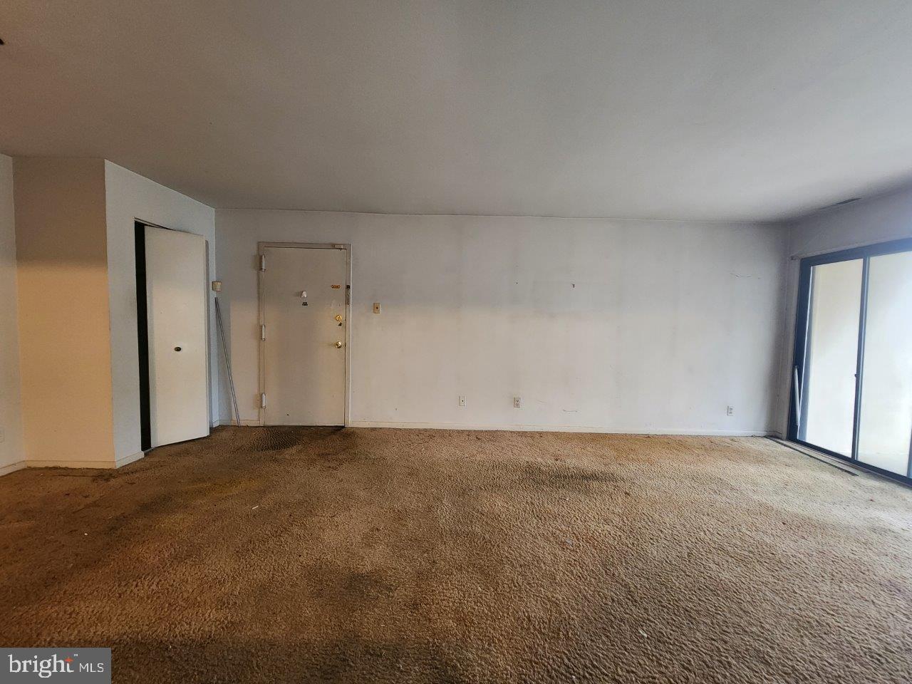 10135 Prince Place, Unit 1036A Upper Marlboro, MD 20774 - Photo 6 of 16 a view of an empty room and window