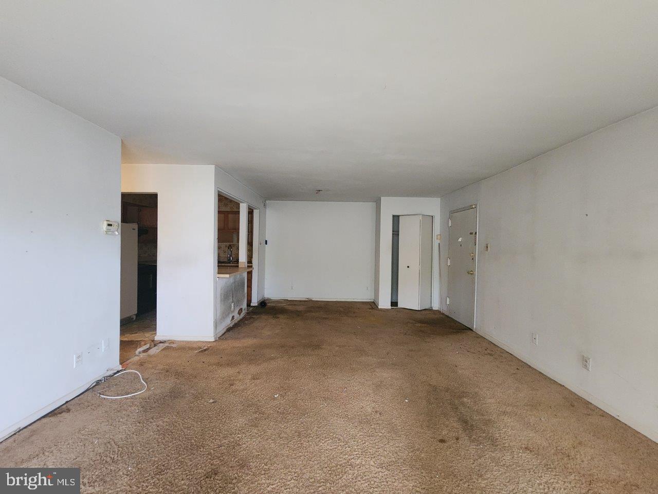 10135 Prince Place, Unit 1036A Upper Marlboro, MD 20774 - Photo 7 of 16 an empty room with an entryway