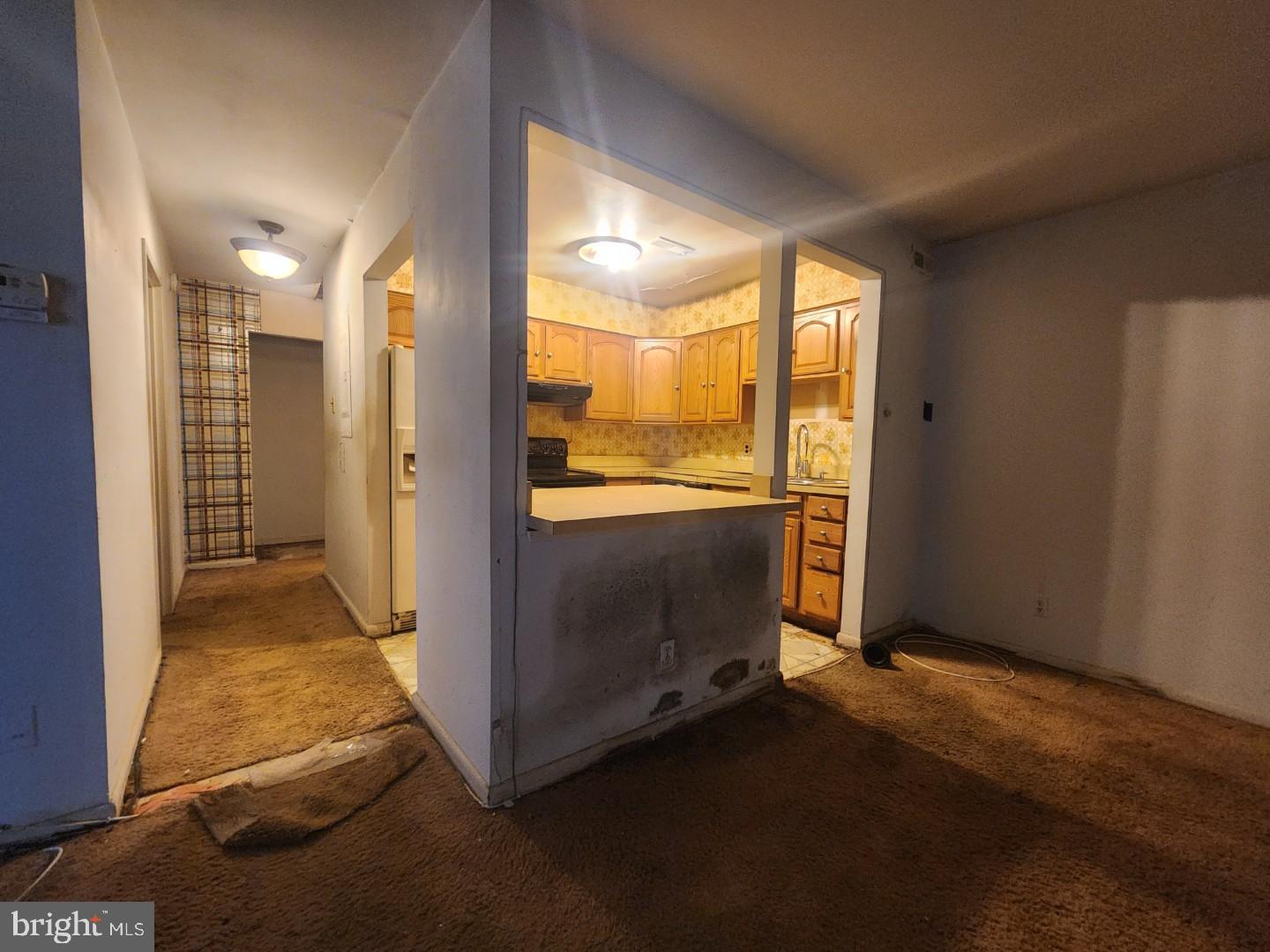 10135 Prince Place, Unit 1036A Upper Marlboro, MD 20774 - Photo 8 of 16 a view of a room with an entryway