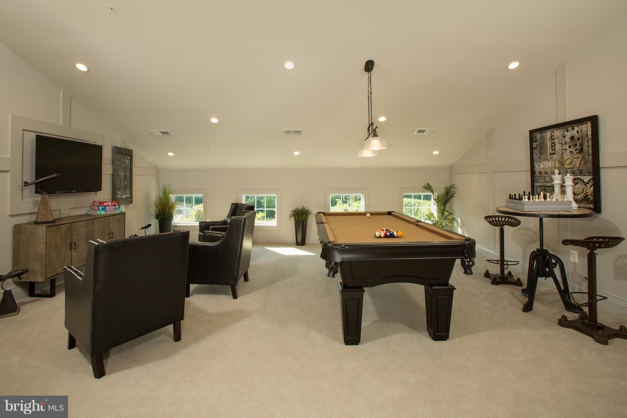 2603 Maple Rock Road Hanover, MD 21076 - Photo 9 of 22 a living room with furniture and a flat screen tv