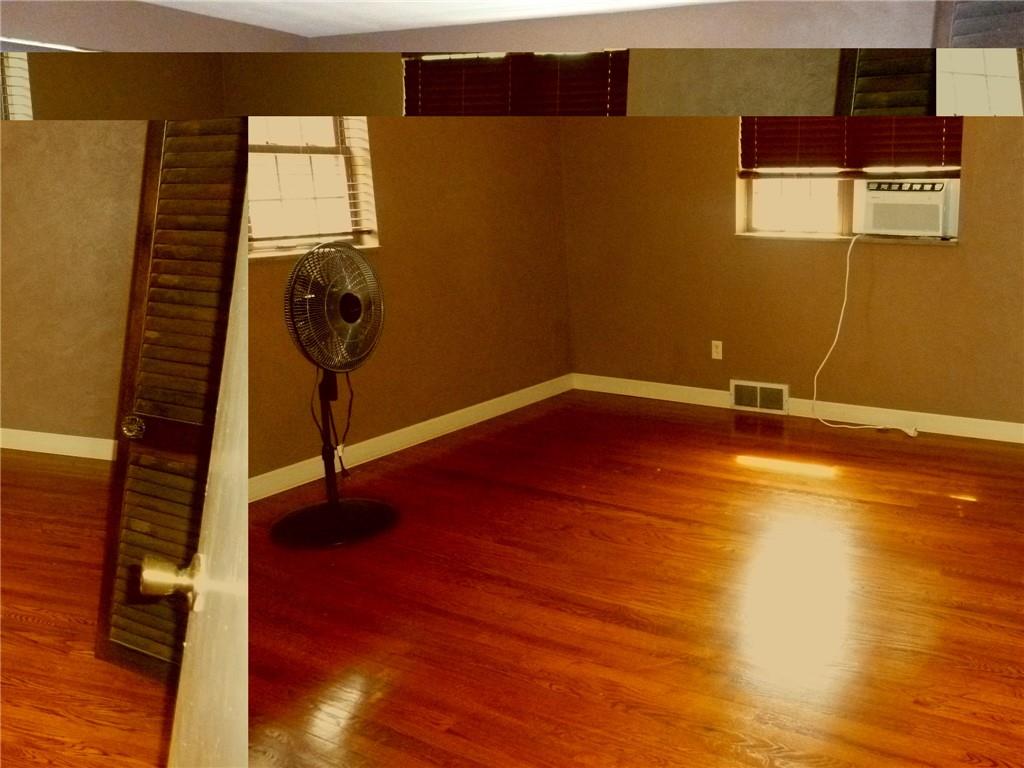 28 Kenridge Drive McKees Rocks, PA 15136 - Photo 13 of 26 a view of empty room with wooden floor