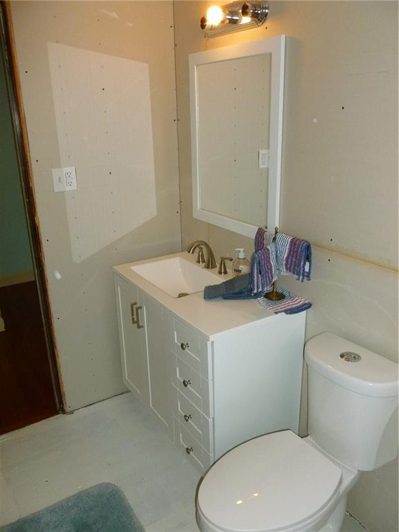 28 Kenridge Drive McKees Rocks, PA 15136 - Photo 17 of 26 a bathroom with a sink a toilet and a mirror