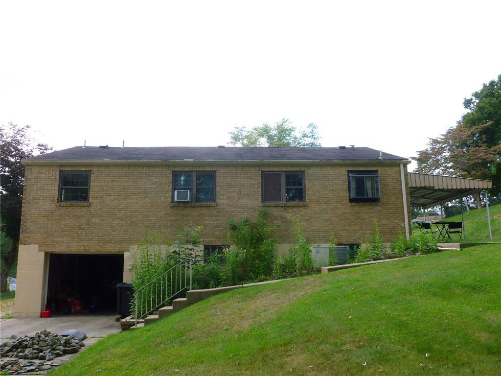 28 Kenridge Drive McKees Rocks, PA 15136 - Photo 24 of 26 a view of a house with a backyard