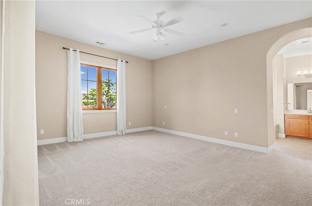 860 Vista Del Rio Nipomo, CA 93444 - Photo 18 of 45 an empty room with windows and closet