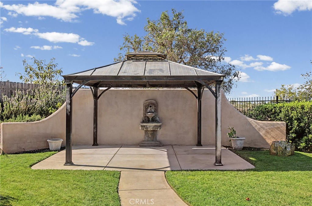 860 Vista Del Rio Nipomo, CA 93444 - Photo 33 of 45 a front view of a house with garden