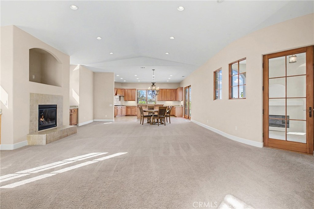 860 Vista Del Rio Nipomo, CA 93444 - Photo 9 of 45 a view of livingroom with furniture fireplace and window