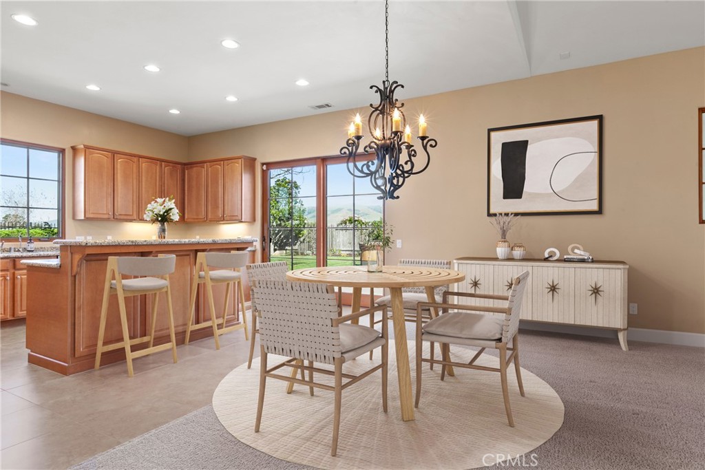 860 Vista Del Rio Nipomo, CA 93444 - Photo 10 of 45 a view of a dining room with furniture window and wooden floor