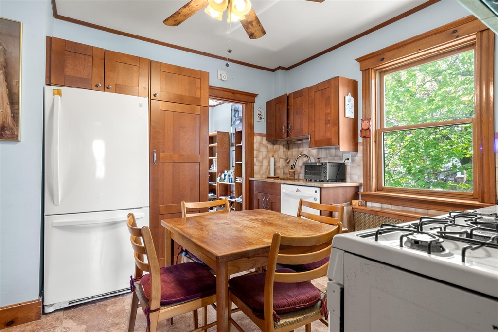511 Beech Street Boston, MA 02131 - Photo 8 of 14 a view of a dining room with furniture window and outside view