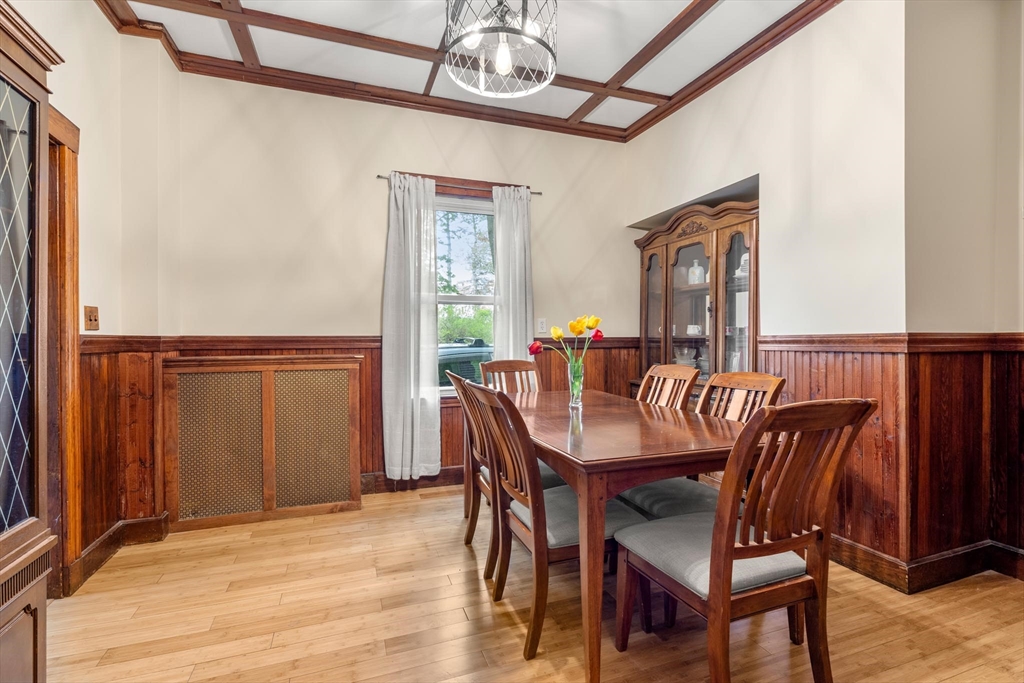 511 Beech Street Boston, MA 02131 - Photo 10 of 14 a view of a dining room with furniture window and wooden floor